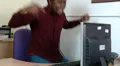 Businessman jumps to feet in anger and hits computer HD Footage