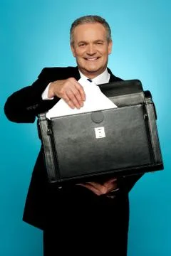 Businessman keeping documents safely Stock Photos
