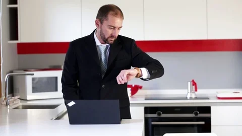 Businessman in the kitchen Stock Footage 109399351