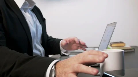 Businessman Knocks Over External Hard Drive Stock Footage 51234660