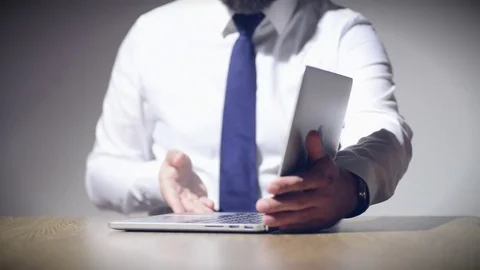 Businessman with laptop Stock Footage