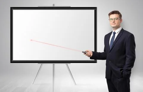 Businessman with laser pointer and copyspace white wall Stock Photos