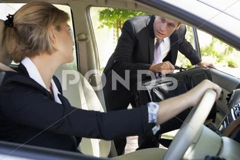 Businessman Late For Car Pooling Journey Into Work Stock Photos