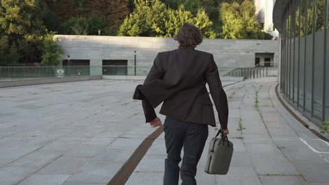 Businessman is late for work Stock Footage 114010051
