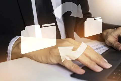 Businessman look up documents and sort items for efficiency.,Systematic sea.. Stock Photos