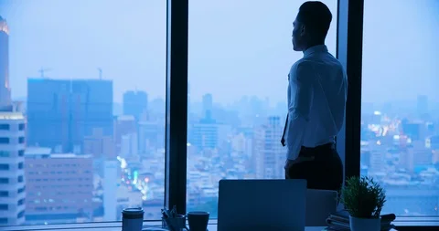 Businessman look through window Stock Footage 110793825