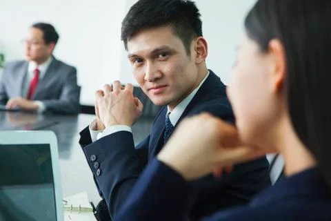 Businessman Looking at Camera Stock Photos