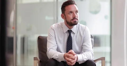 Businessman looking confidently to camera Stock Footage 79150487