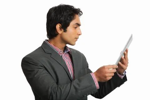 Businessman looking at a digital tablet Fotos Stock