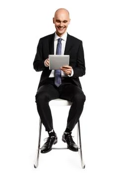 Businessman Looking at Digital Tablet Stock Photos
