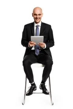 Businessman Looking at Digital Tablet Stock Photos
