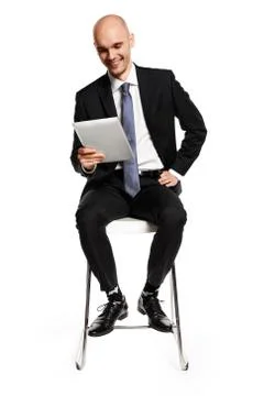 Businessman Looking at Digital Tablet Stock Photos