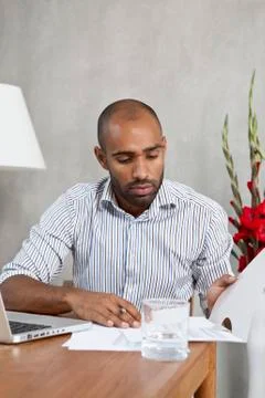A businessman looking at documents Fotos de archivo