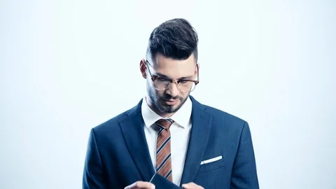 Businessman looking at empty wallet on white Stock Footage 115420680