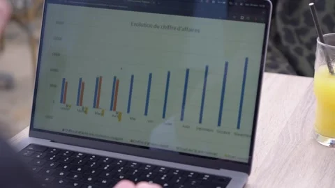 Businessman looking at a graph of the evolution of turnover on a diagram Stock Footage 309099991
