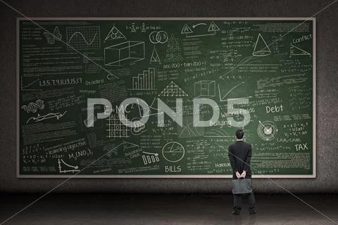 Businessman looking at hand drawn chalkboard Stock Photos