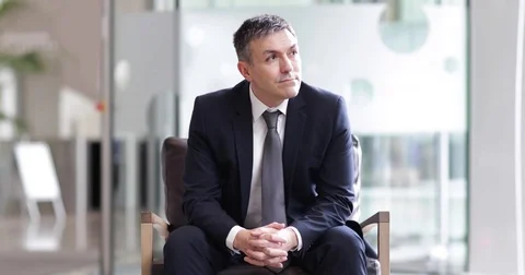 Businessman looking out of window Stock Footage 79148680