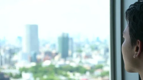 Businessman looking out of the window 스톡 동영상 162277220