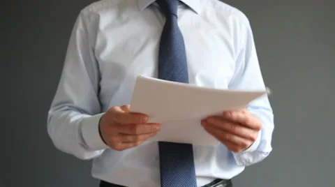 Businessman looking over documents Video stock 31731088