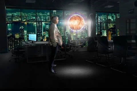 Businessman looking for a solution to a problem in the office late at night Stock Photos