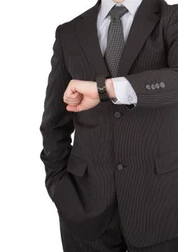 Businessman looking at watch Stock Photos