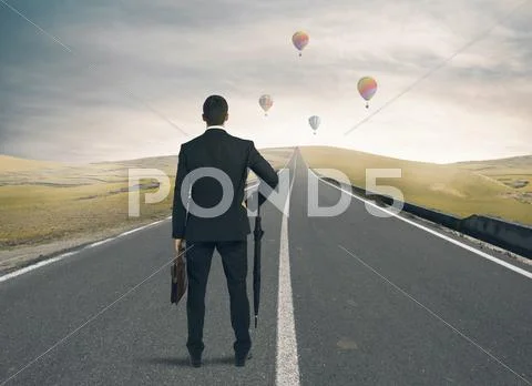 Businessman looking the way to success Stock Photos
