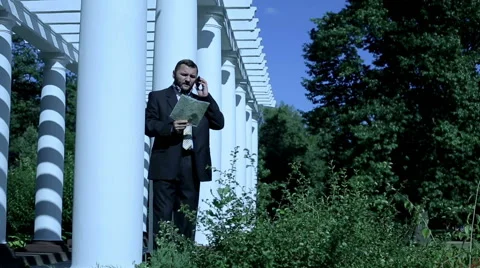 Businessman looking way using a map   Stock Footage 59089383