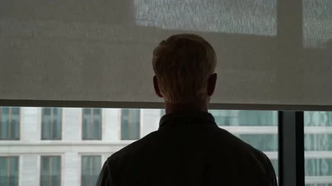Businessman looking at window in the office Stock Footage 150052043