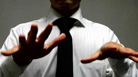 A businessman makes a calm gesture. Video stock 335508143