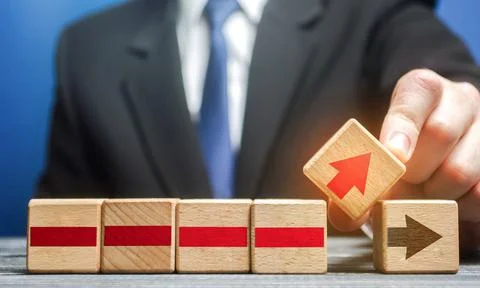 Businessman makes changes to the business process on an alternative path. Def Stock Photos