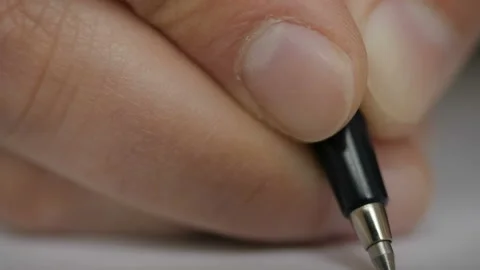 Businessman makes a note in notebook. Extreme close up of male business hand Stock Footage 108211342