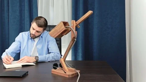 Businessman makes a note in notebook Stock Footage 69881803