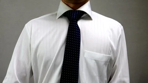 A businessman makes a sign language gesture indicating he understands. Stock Footage 335802432