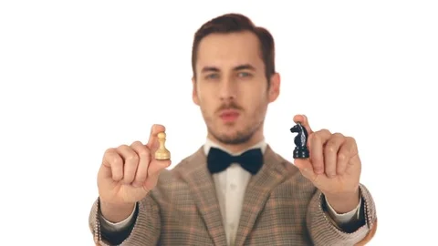 Businessman making a choice between chess pieces Stock-Footage 72031524