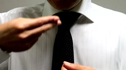 A businessman making a gesture of eating. Stock Footage 335475122