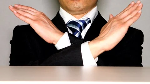 A businessman making a gesture of refusal 스톡 동영상 334966931