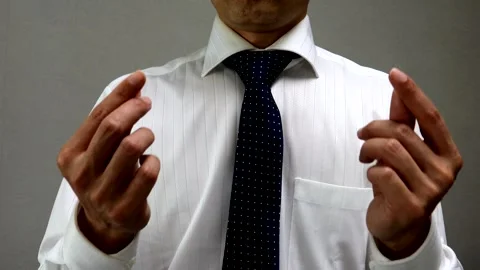 A businessman making a heart shape with his fingers Stock Footage 335720134