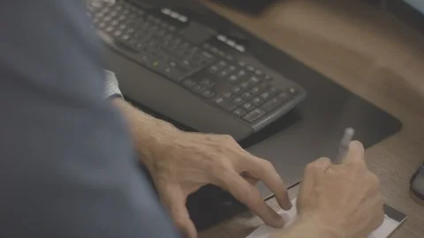 Businessman making notes engaged in small company projects Stock Footage 94228196