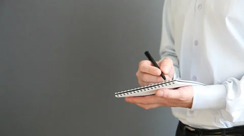 Businessman making notes on the paper Stock Footage 30349797