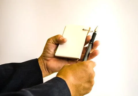 Businessman making notes on the paper Stock Photos