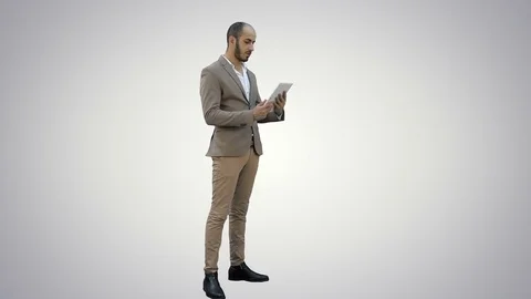 Businessman making video call using tablet on white background Stock-Footage 73641181
