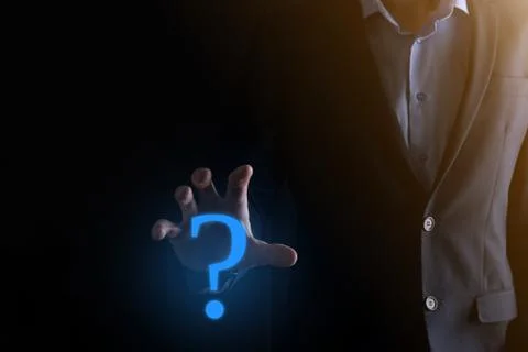 Businessman man hand hold interface question marks sign web. Ask quiestion on Stock Photos