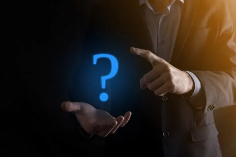 Businessman man hand hold interface question marks sign web. Ask quiestion on Stock Photos