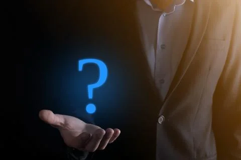 Businessman man hand hold interface question marks sign web. Ask quiestion on Stock Photos