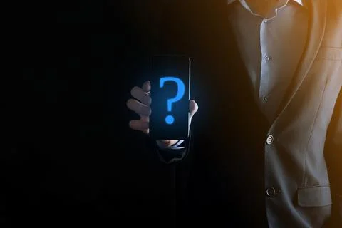 Businessman man hand hold interface question marks sign web. Ask quiestion on Stock Photos