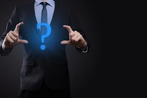 Businessman man hand hold interface question marks sign web. Ask quiestion on Stock Photos