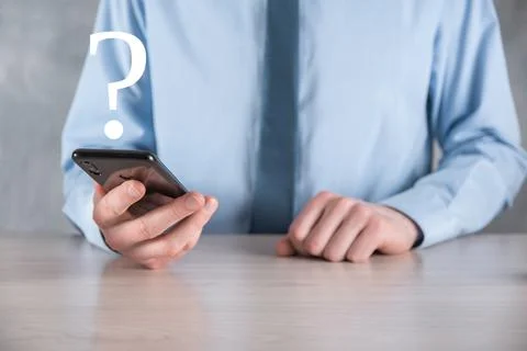 Businessman man hand hold interface question marks sign web. Ask quiestion on Stock Photos