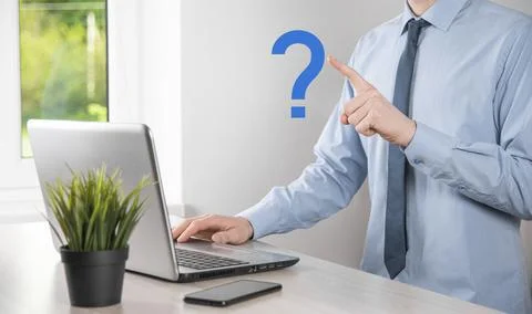 Businessman man hand hold interface question marks sign web. Ask quiestion on Stock Photos