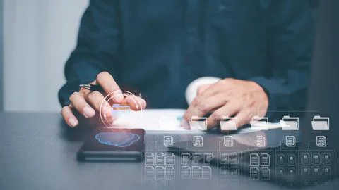 Businessman manages corporate document database through cloud, big data cyb.. 스톡 사진