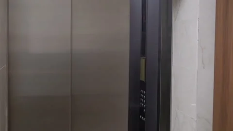 Businessman meeting visiting client at elevator hall. Stock Footage 133547495